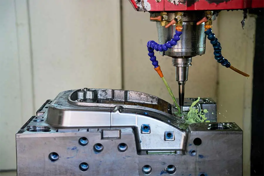 Gege Mould manufacturing facility interior — additional workshop angle showing mold tooling workstations and production layout