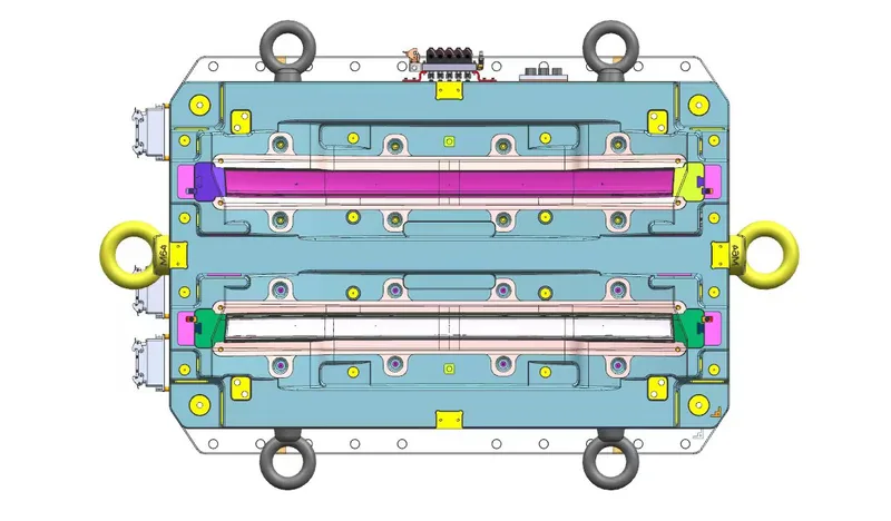 Two-color automotive running light injection mold — rotary platen configuration and mold base detail during in-house tryout